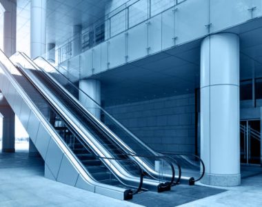 Two escalators in modern office building Two escalators in modern office building